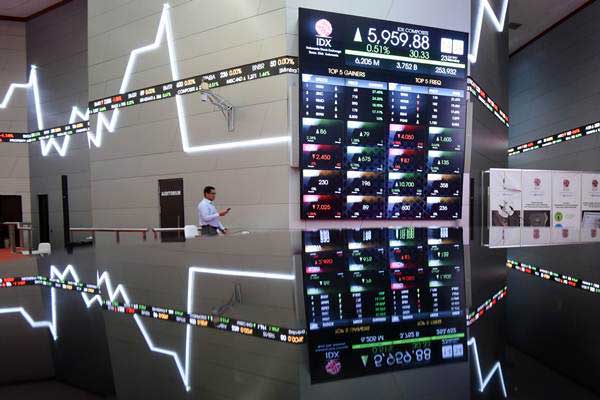 Dow Jones Tekor, Investor Sorot Keputusan The Fed