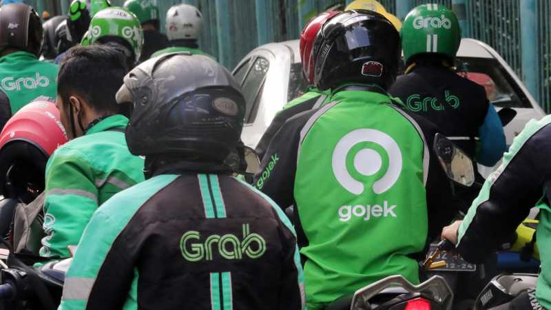 Grab x GOTO: Konsolidasi Raksasa Digital. DOK/ISTIMEWA Grab x GOTO: Konsolidasi Raksasa Digital atau Ancaman Monopoli Baru?
