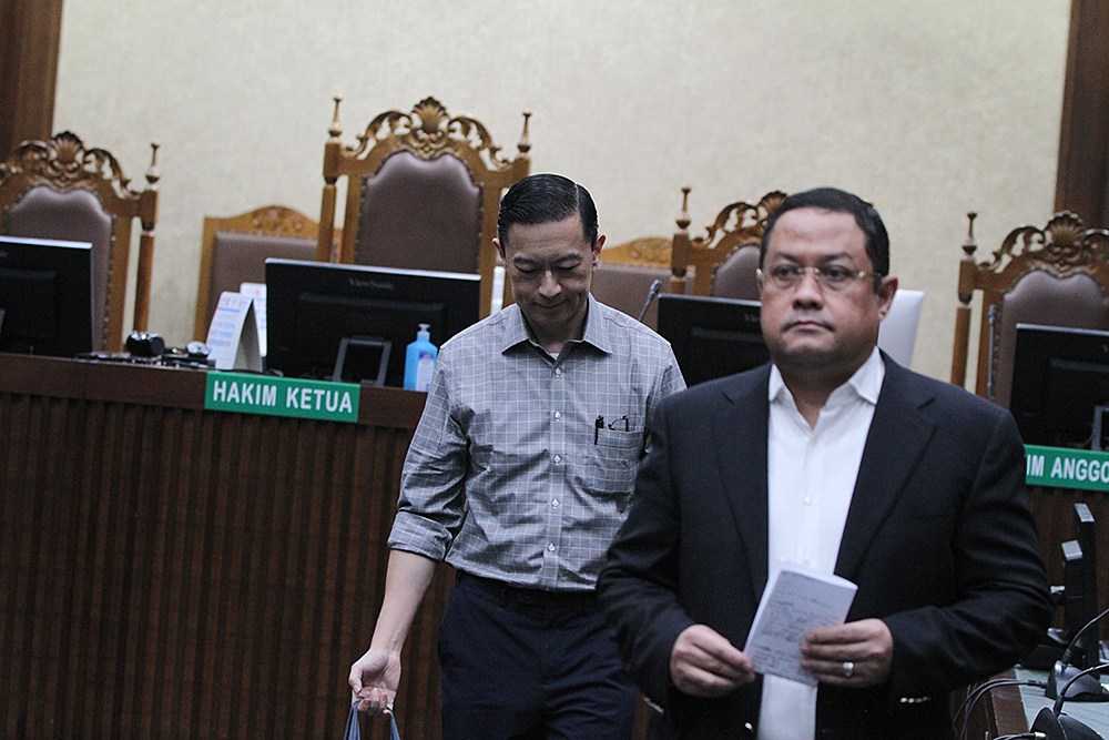 Terdakwa kasus korupsi impor gula Thomas Trikasih Lembong bersama pengacaranya Ari Yusuf Amir, di Pengadilan Tipikor, Jakarta. dok.BeritaNasional/HO/Agus SinPo.id. Vonis Tom Lembong, Kejaksaan Agung Pastikan JPU Ajukan Banding