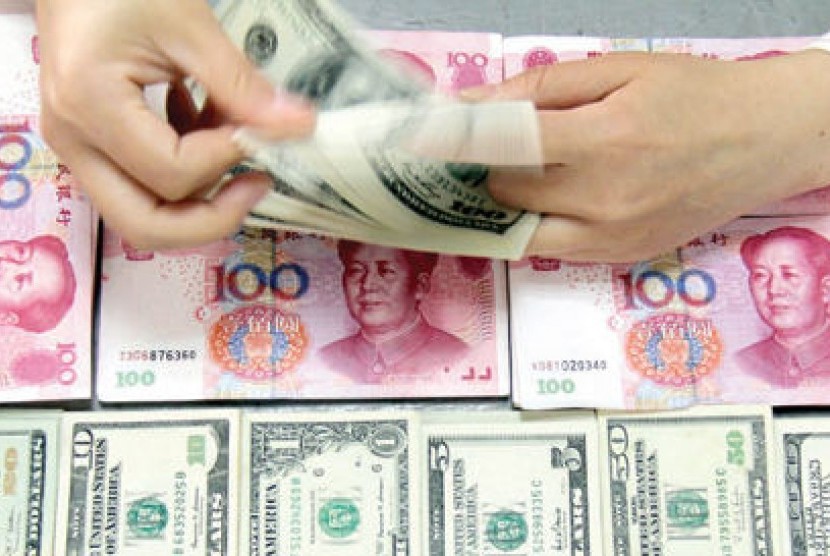 Yuan Pagi Ini Terpuruk 630 Basis Poin ke Level 6.9572 per Dolar AS
