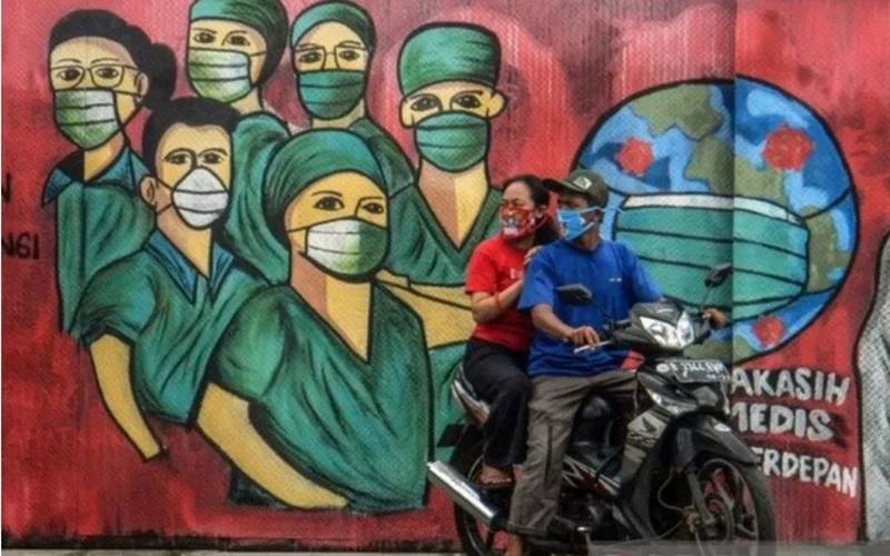 Pandemi Covid-19, Presiden Umumkan Aturan Masker tidak Wajib di Tempat Terbuka